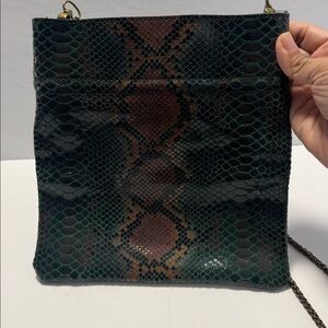 Free People Women's Faux Leather Snakeskin Print Crossbody Bag with Chain Strap.